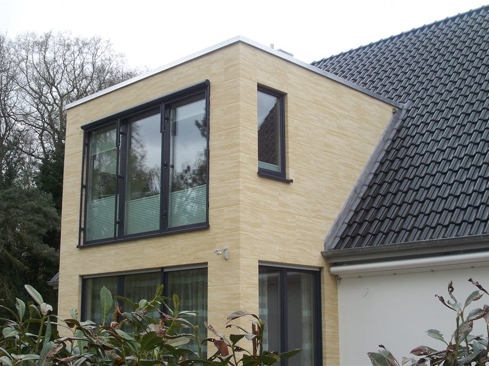 Einfamilienhaus mit Fassade aus Flexiblem Sandstein