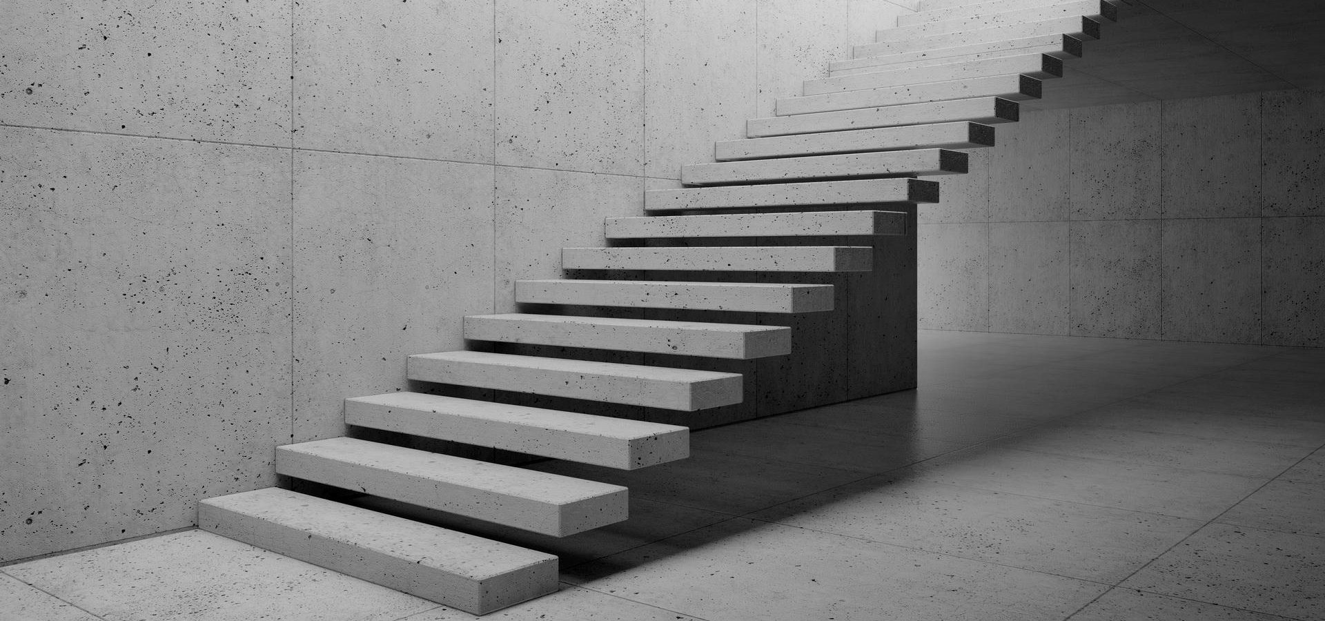 Schwebende Betontreppe in Schwarzweiß